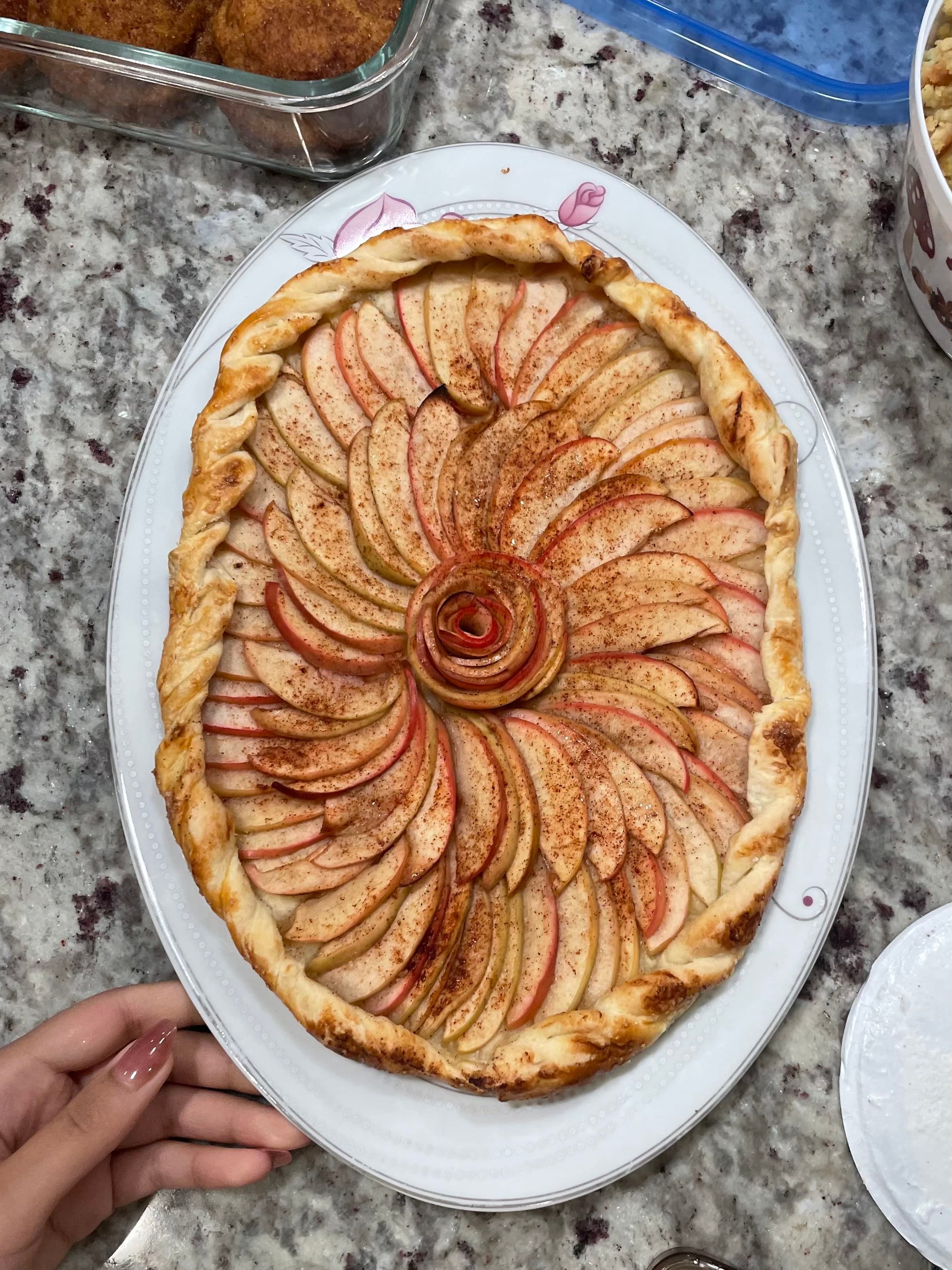 Apple tart arranged in a floral pattern