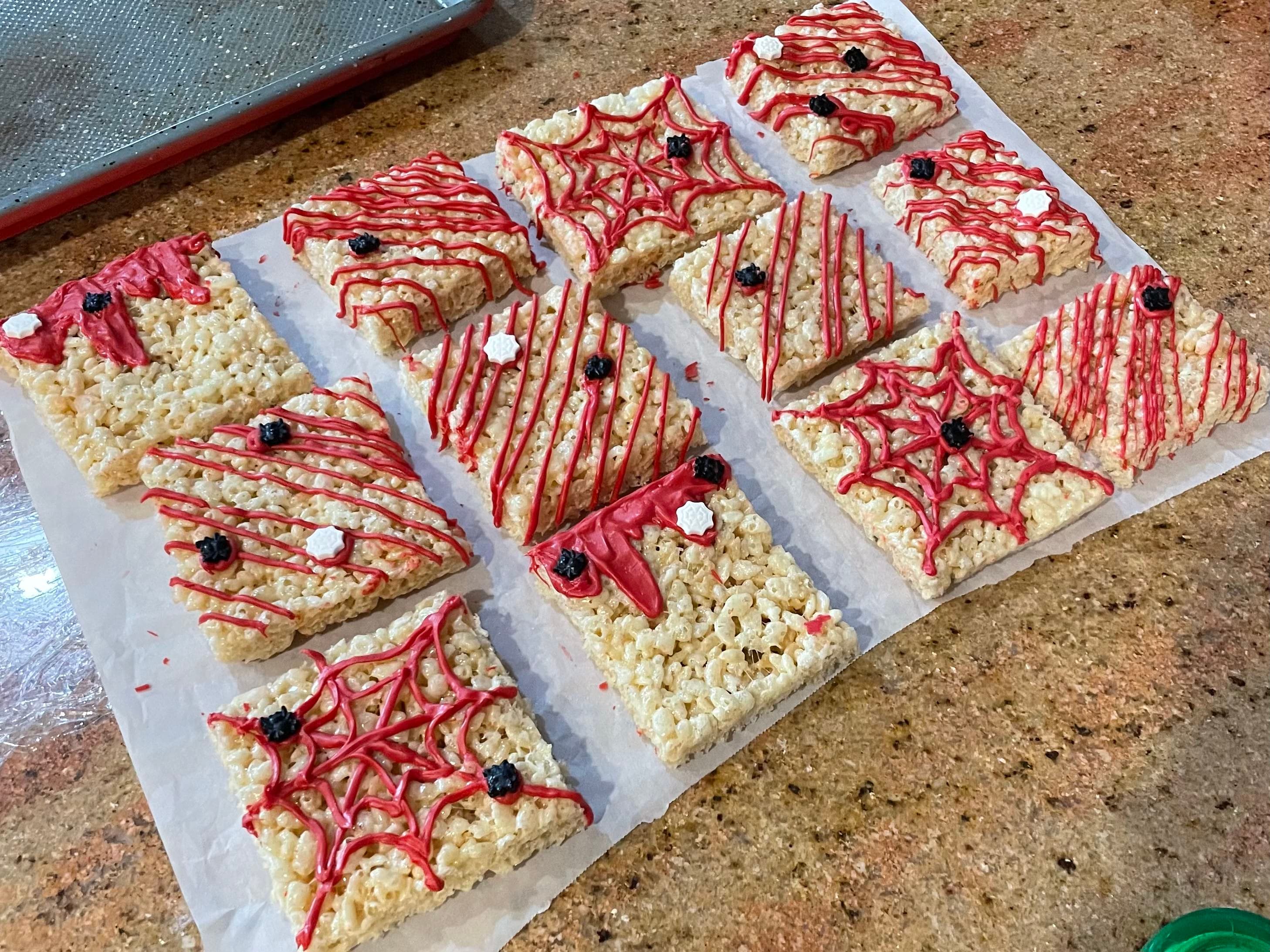 Decorated rice crispy treats with red icing
